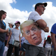 People wait in line for the arrival of President Donald Trump for his, ‘The Great American Comeback Rally’, at Cecil Airport on September 24, 2020 in Jacksonville, Florida.